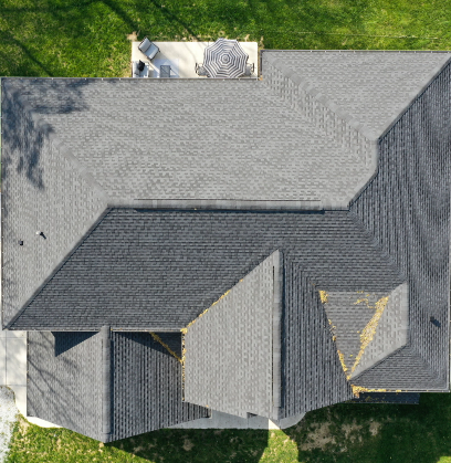 Aerial view of house in Indianapolis after recent roof repairs.