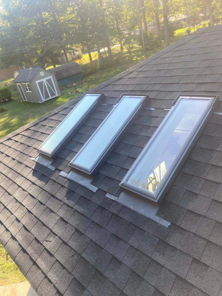Triple Residential Skylight Installation in Indianapolis courtesy of Moss Roofing.