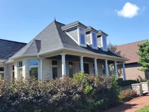 Stone Home with New Gables in Indianapolis courtesy of Moss Roofing