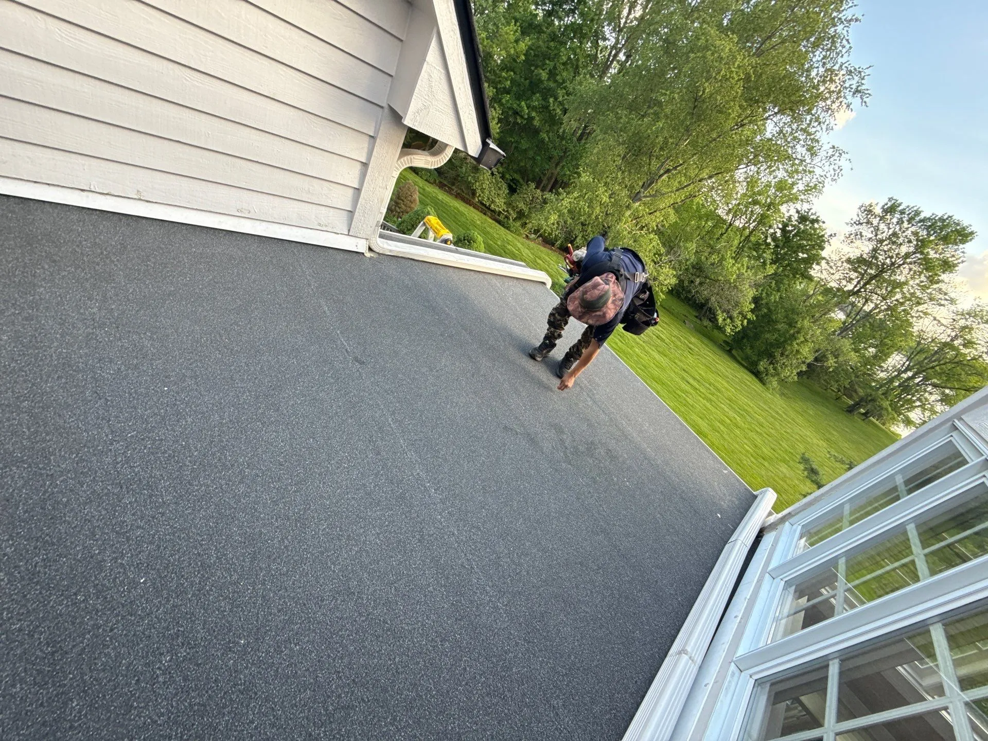 Partial flat roof replacement on residential home