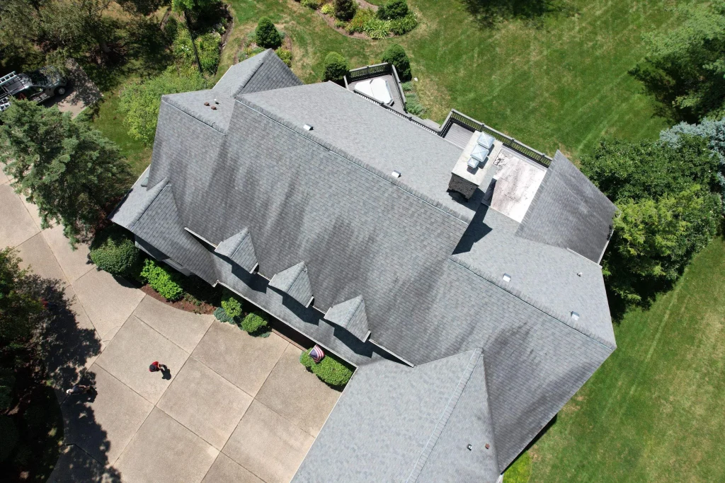 Drone image of residential home that  was n need of a roof replacement 