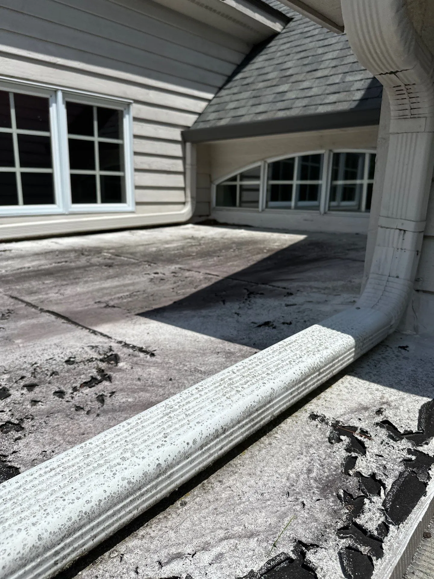 flat roof section that is in need of a replacement