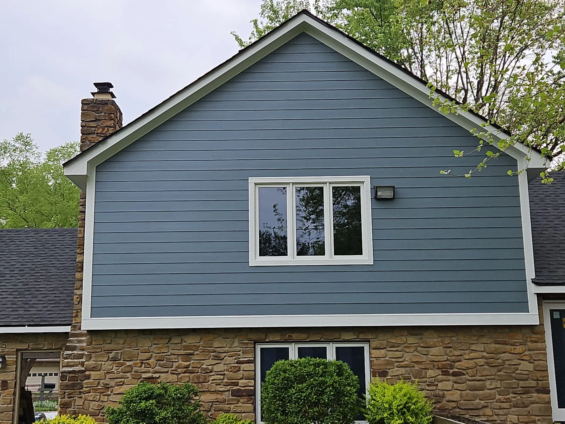 New blue siding installed on Greenwood home