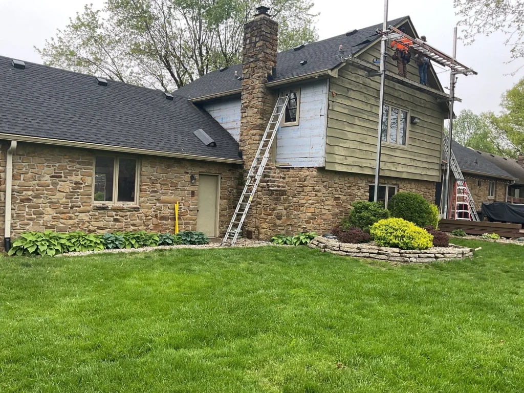 Before Home in Greenwood with ladder