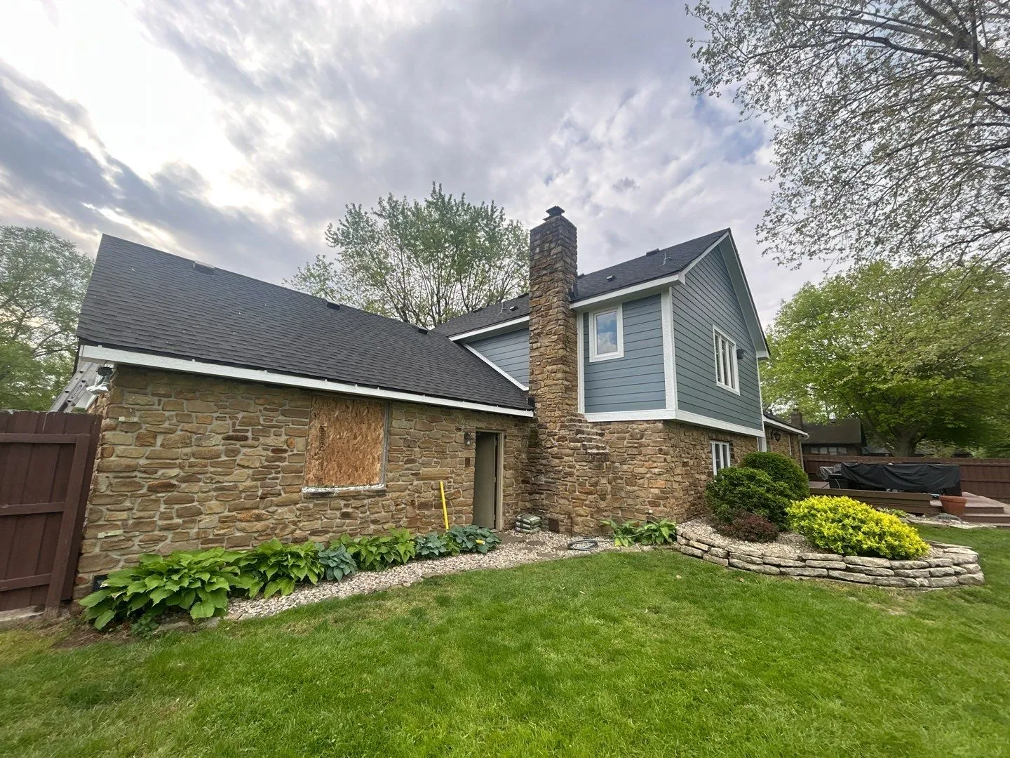 New siding and roof installation on Greenwood home