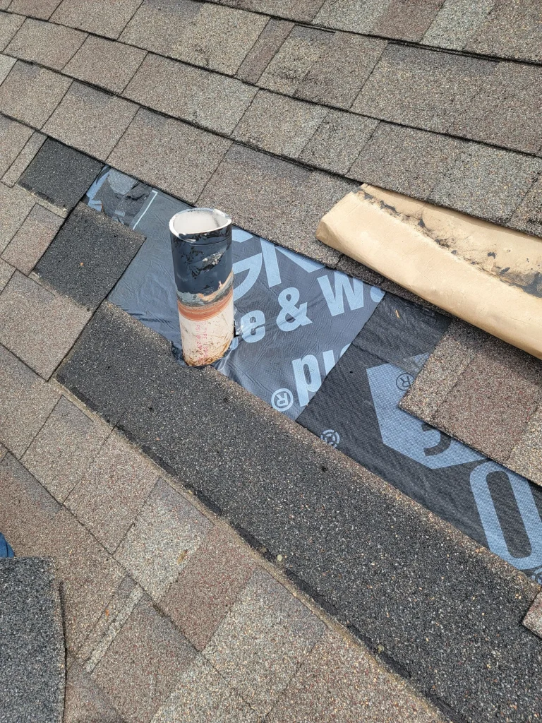 Pipe boot and shingles on a residential home in Indianapolis getting repaired.