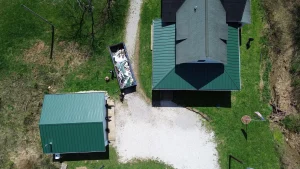 ariel view of both barn and porch/deck metal roof installation