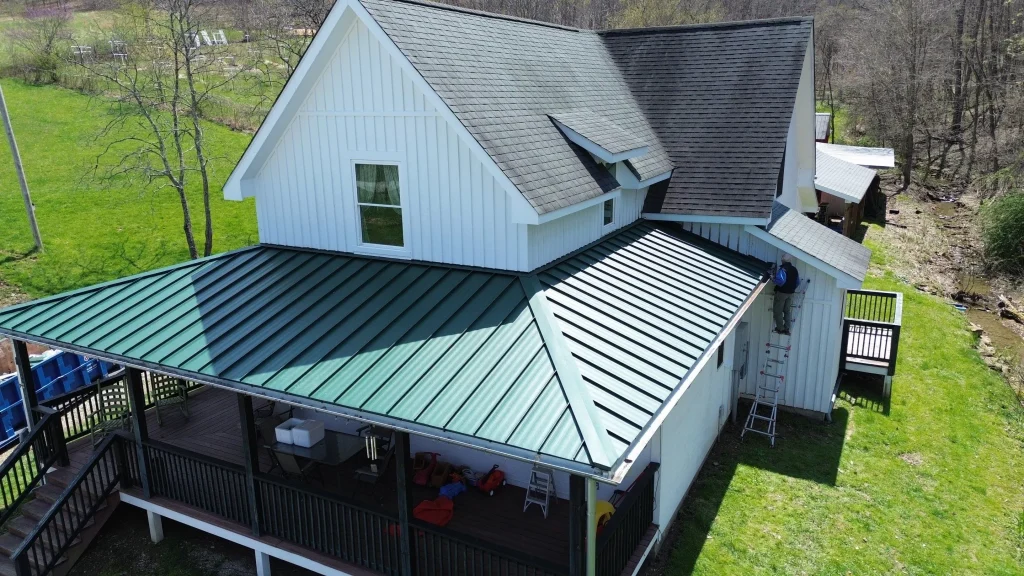 Green Metal Roof Replacement on deck/porch