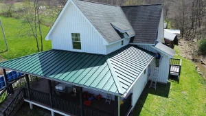 Green Metal Roof Replacement on deck/porch