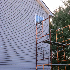 Hail damage on the siding of a home.