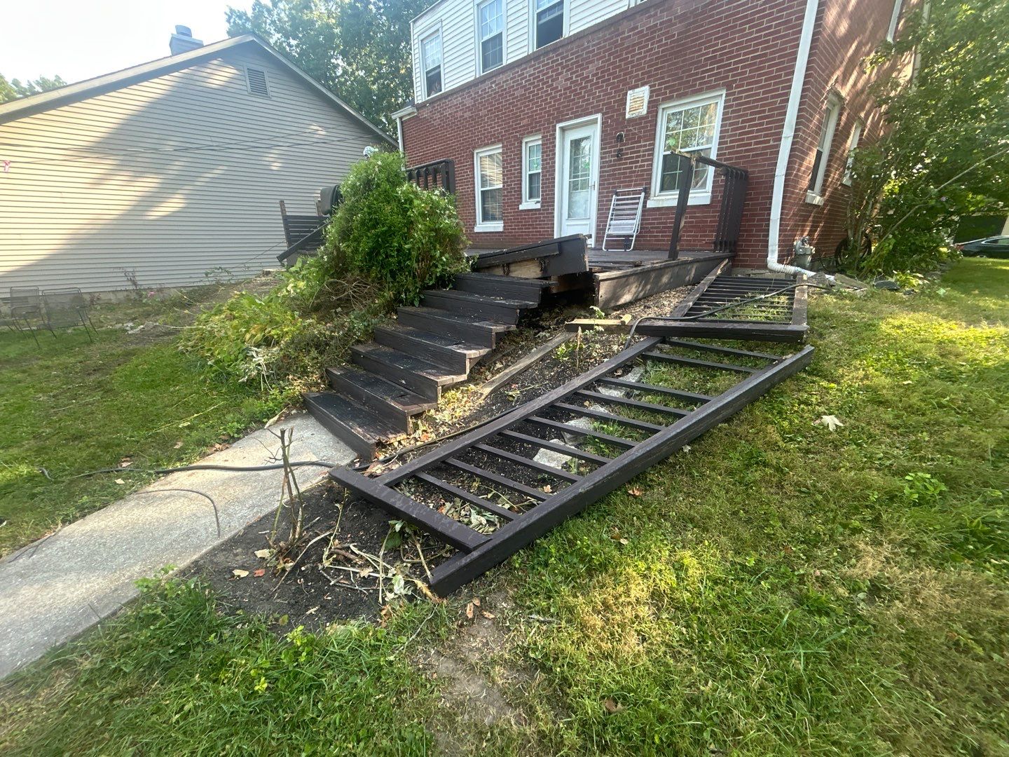Small tree damaging a deck Danville storm damage roof event in Hendricks County